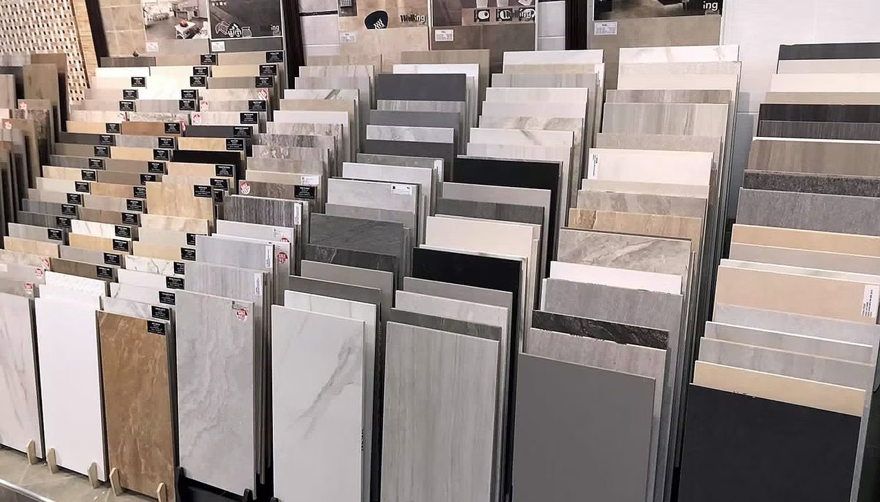 Material samples and cabinetry finishes displayed in the Wolf in the Woods Davie showroom